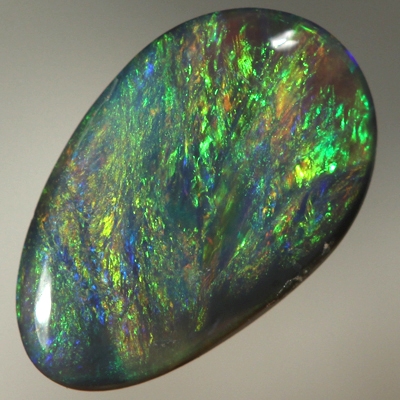 SOLID BLACK OPAL Strong, bright golden fire. Orange and green
